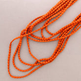 Multi-strand wool bead necklace